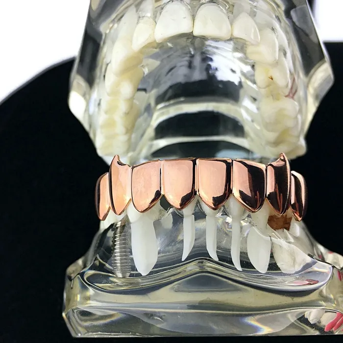 14K Rose Gold Plated Eight Tooth Bottom Vampire Fang Grillz Bling Cartel Admin Earrings 14K Rose Gold Plated Eight Tooth Bottom Vampire Fang Grillz Bling Cartel Admin Earrings