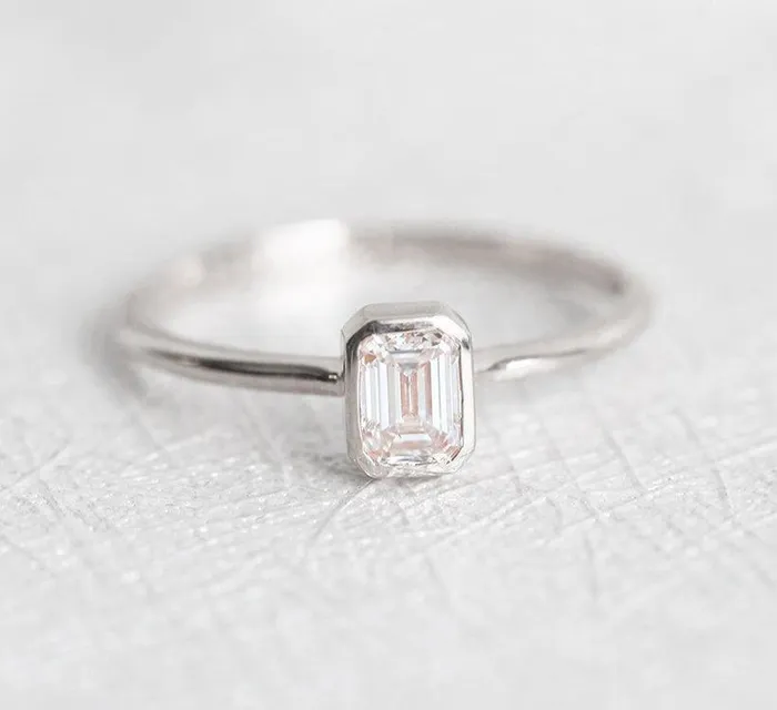Elegant Solitaire EmeraldCut Diamond Engagement Ring Capucinne Rings