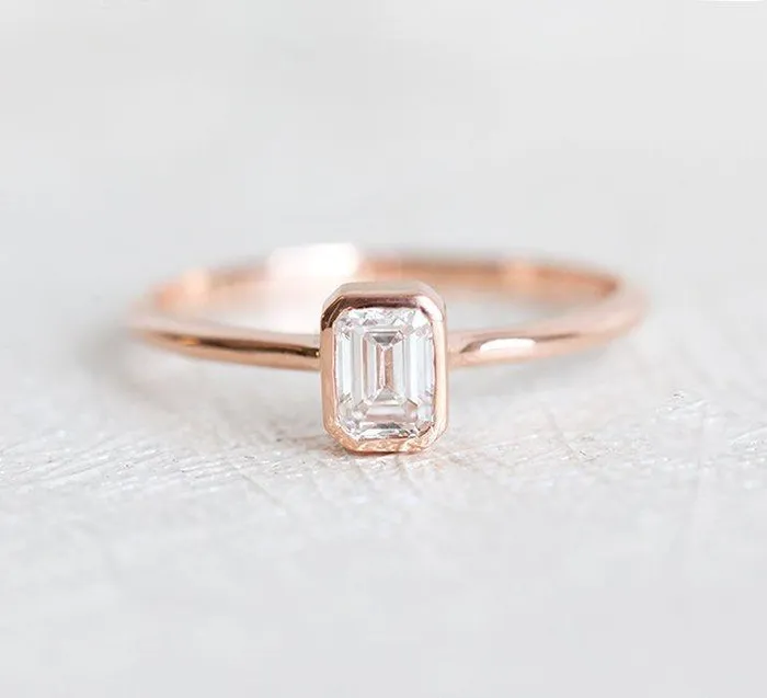 Elegant Solitaire EmeraldCut Diamond Engagement Ring Capucinne Rings