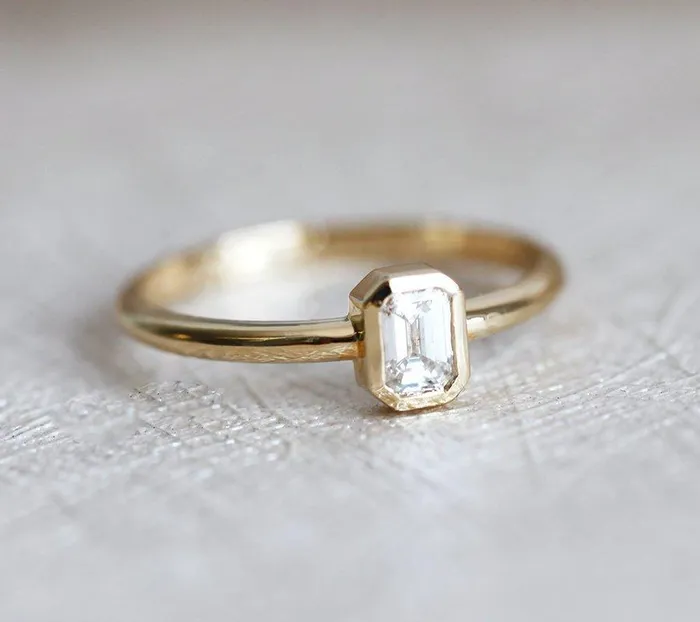 Elegant Solitaire EmeraldCut Diamond Engagement Ring Capucinne Rings