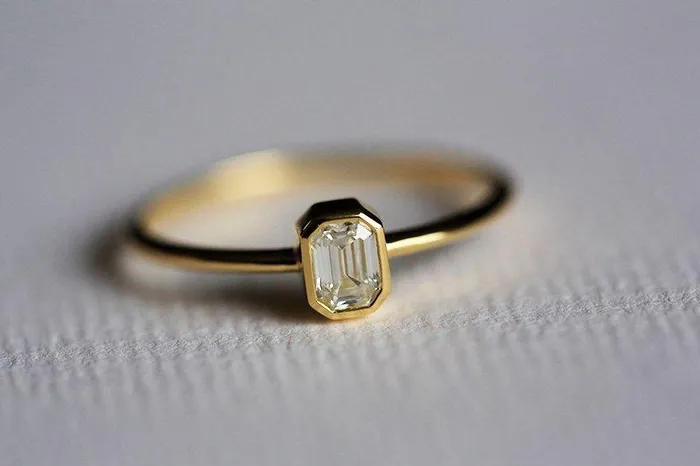 Elegant Solitaire EmeraldCut Diamond Engagement Ring Capucinne Rings