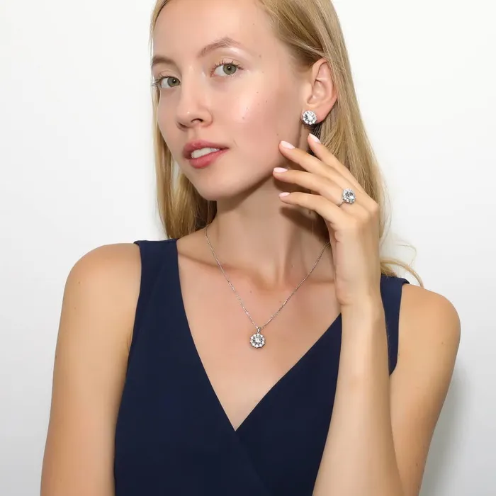 Flower Halo CZ Omega Back Stud Earrings in Sterling Silver BERRICLE Earrings
