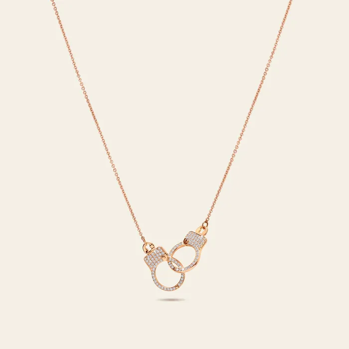 Hand crafted in 18k rose gold and set with 100 highquality round brilliant cut diamonds Necklaces Love Lockdown Interlocking Diamond Necklace Hand crafted in 18k rose gold and set with 100 highquality round brilliant cut diamonds Necklaces Love Lockdown Interlocking Diamond Necklace