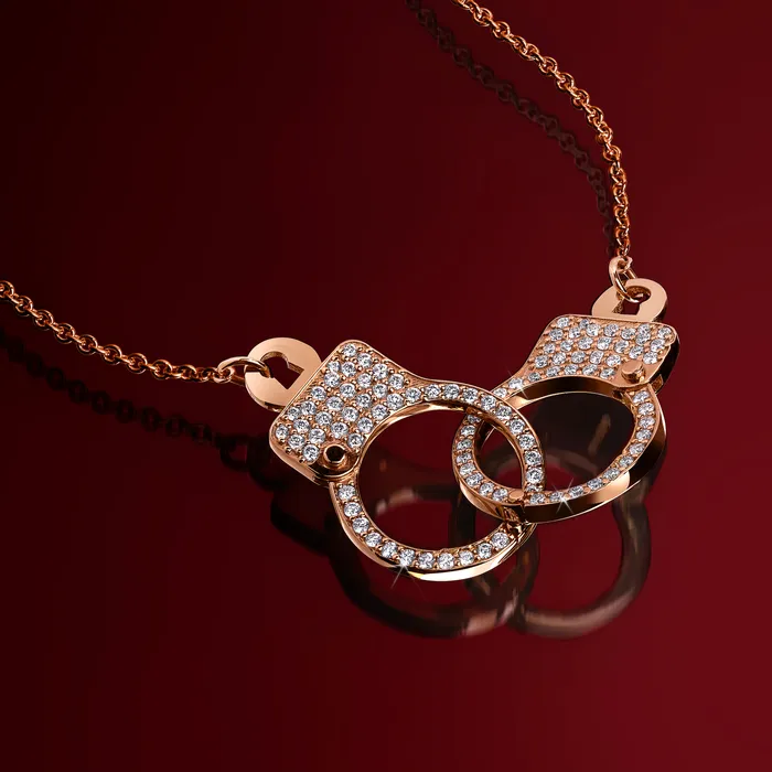Hand crafted in 18k rose gold and set with 100 highquality round brilliant cut diamonds Necklaces Love Lockdown Interlocking Diamond Necklace